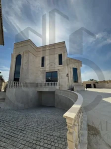 Interior view of central staircase and small lobby void providing natural light